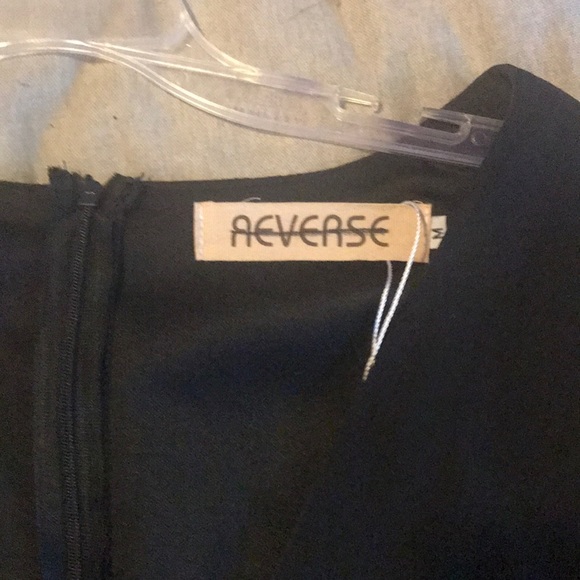 Black romper flare detailed sleeves - Picture 3 of 3